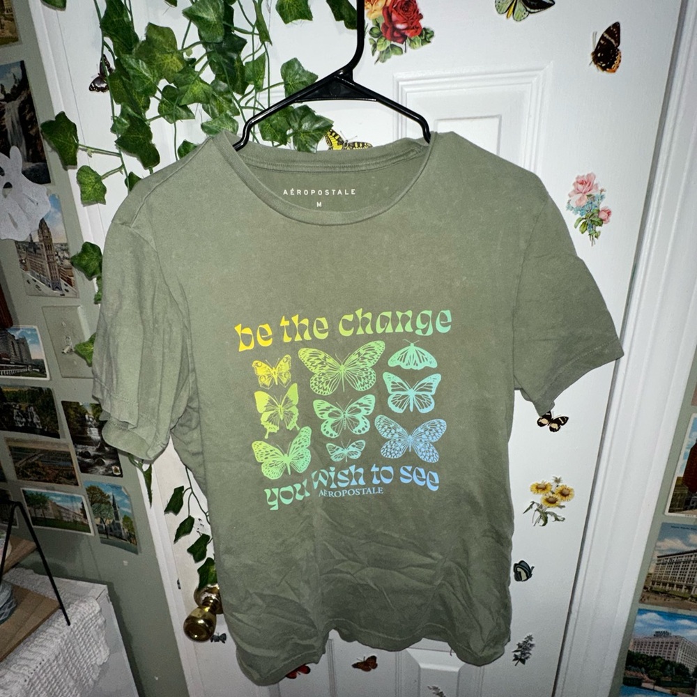 A green graphic T-shirt